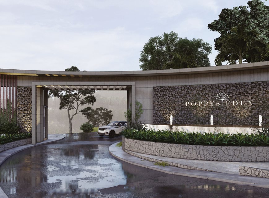 Architectural view of the stone-clad entrance arch at Poppys Eden
